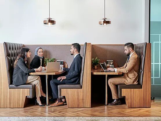 Servcorp Abu Ouf Plaza in Madinah features elegant booth seating, providing clients with a quiet, professional space for meetings and individual work.